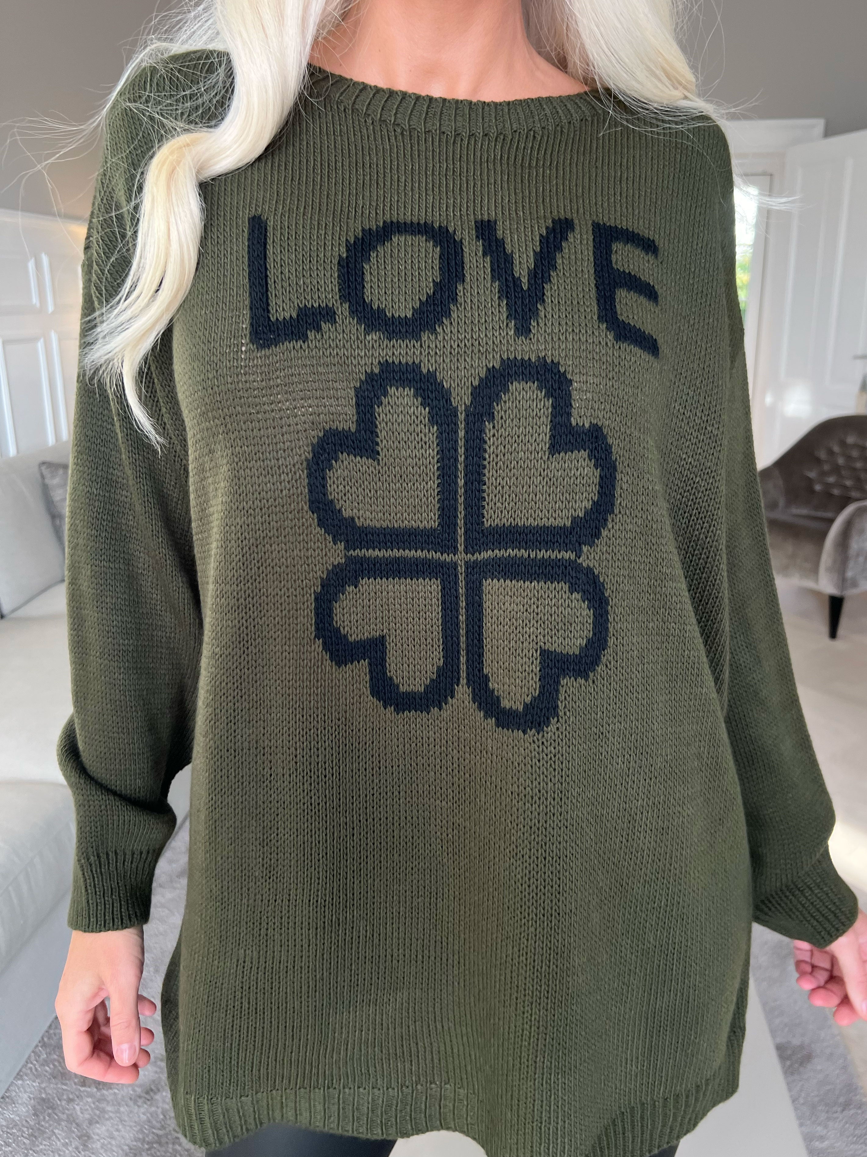 Mia - Strikbluse med firkløver på